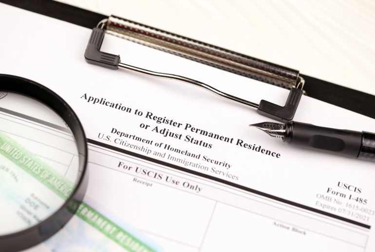 I-485 Application to register permanent residence or adjust status form and green card